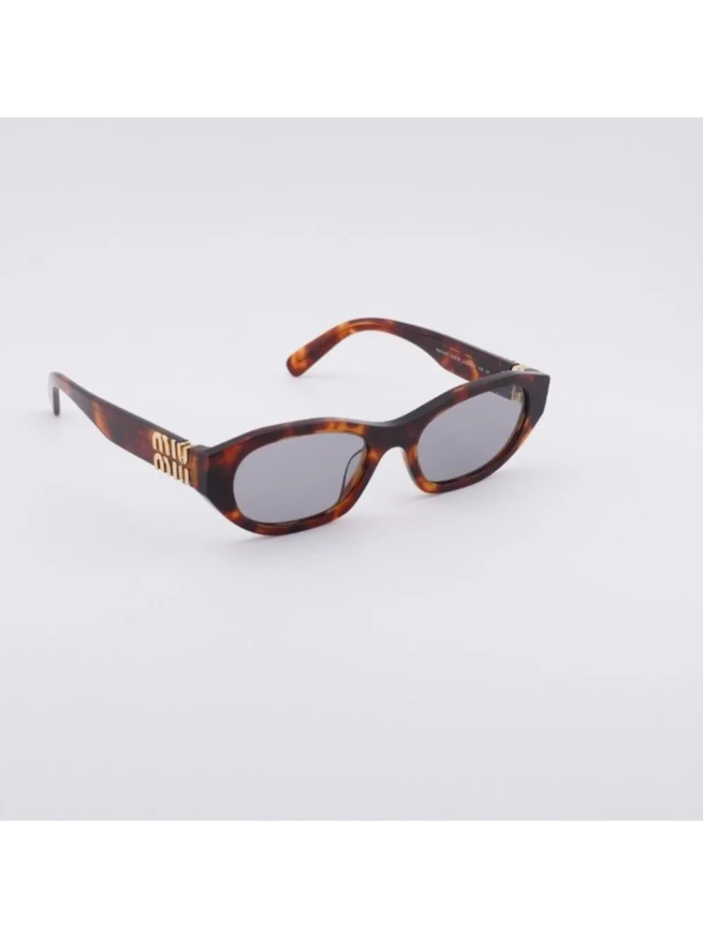 Miu Miu MUA03S 21C40O Sunglasses Havana Mahogany Oval Frame, Grey Lenses